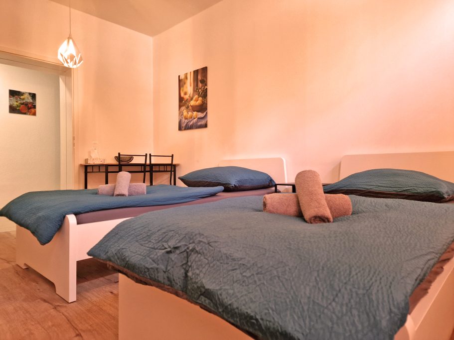 Schlafzimmer 1 HappySide Travel&Work 1